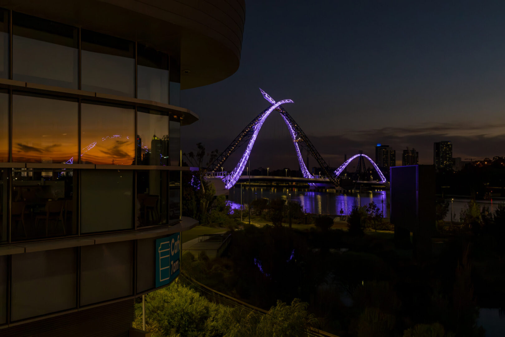 A view of the lights from an apartment balcony.